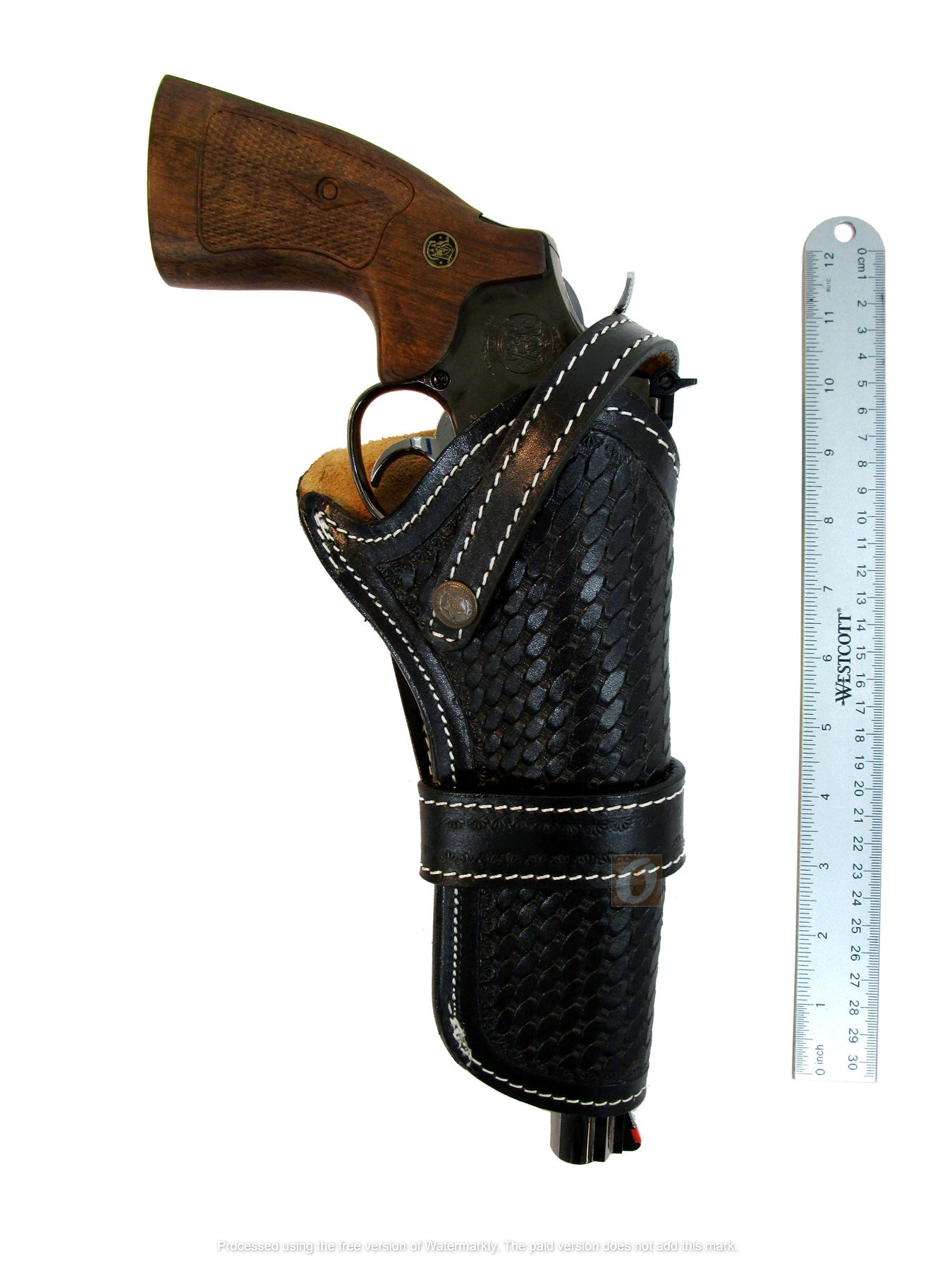 Premium black leather revolver holster with intricate basket weave tooling, available in both right and left-handed designs, perfect for western enthusiasts.