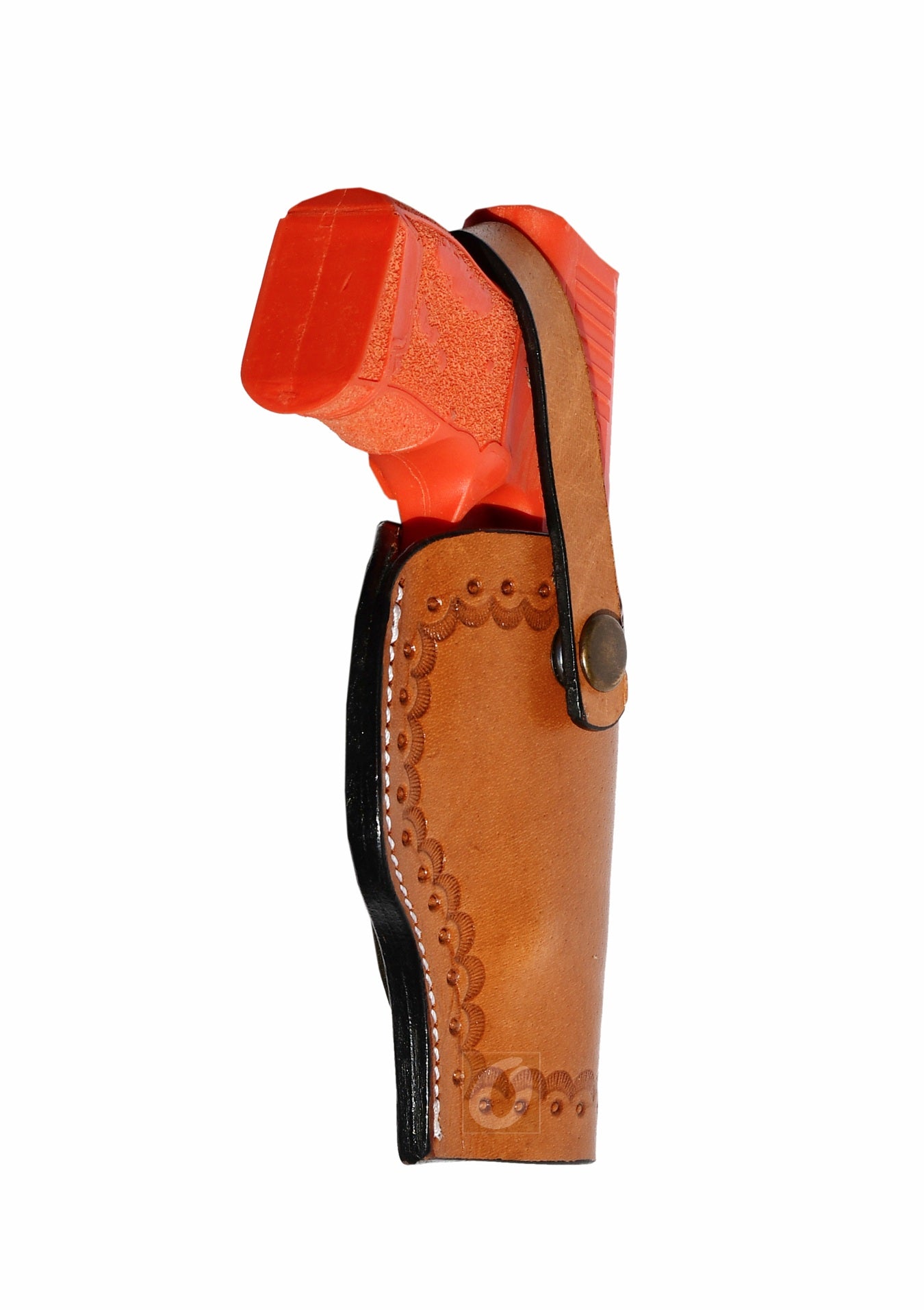 Angled view of tan leather Glock holster, right handed, featuring sea shell tooling for a refined and durable concealed carry option