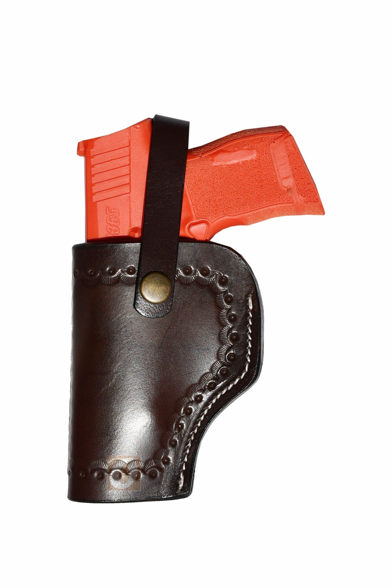 Brown leather Glock holster, left handed, featuring sea shell tooling design for a durable and comfortable concealed carry