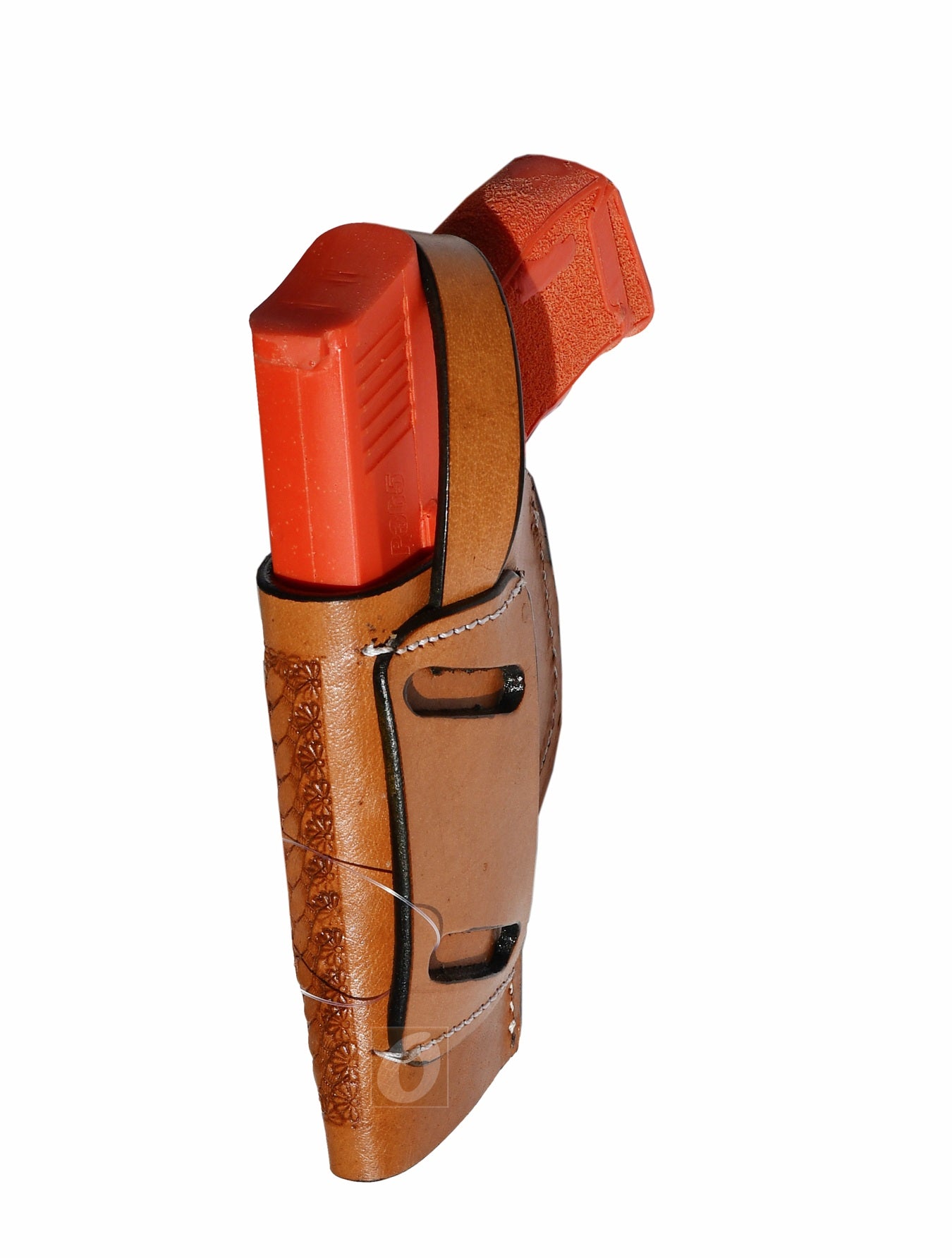 Side view of tan leather Glock holster, right handed, showcasing basket weave tooling for a secure and stylish concealed carry