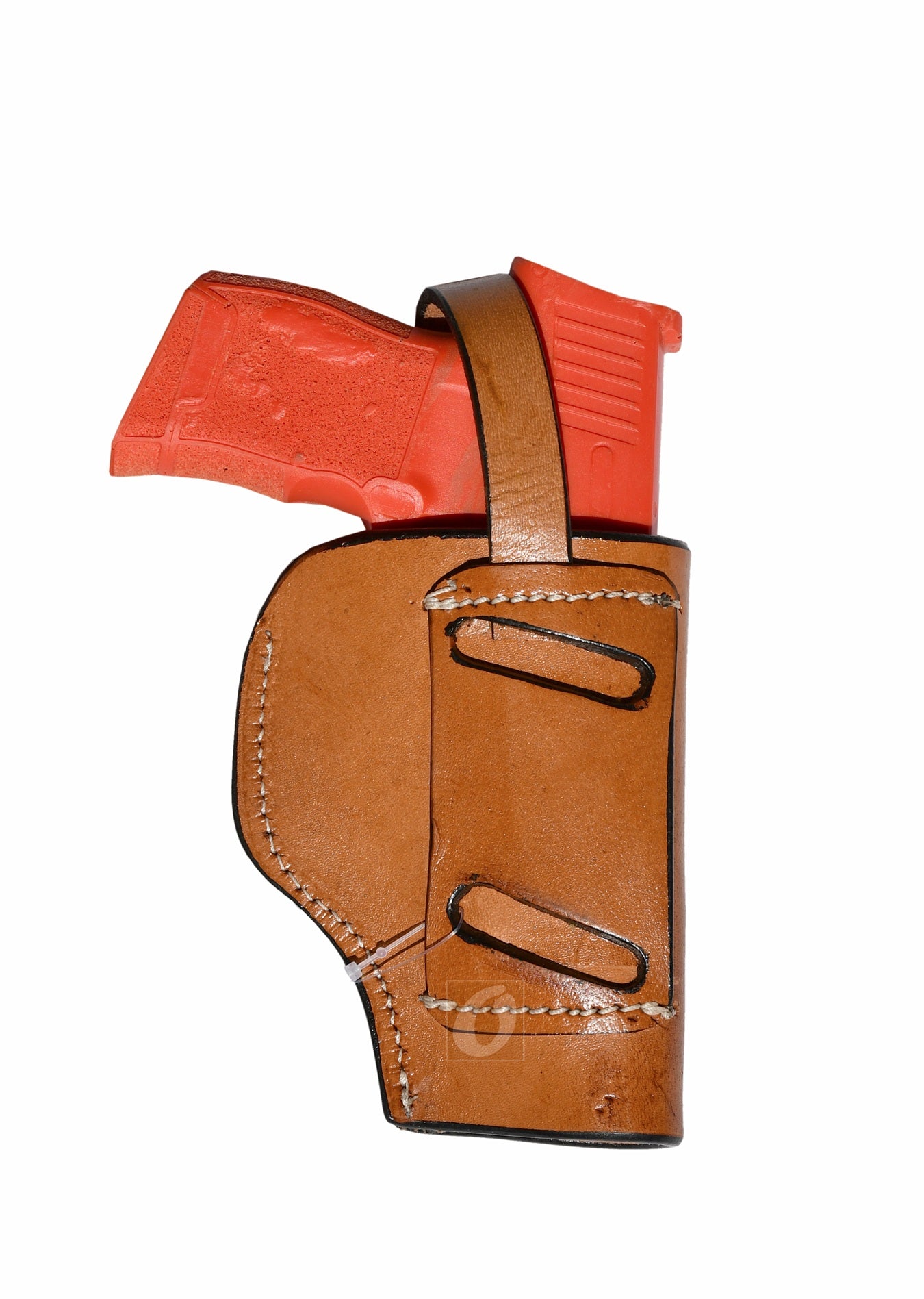 Back view of tan leather Glock holster, left handed, displaying premium craftsmanship and secure fit for concealed carry