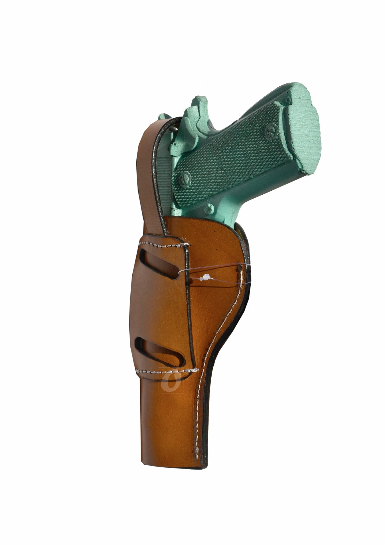 Angled view of a hand-tooled tan 1911 OWB holster, perfect for cowboy action shooting and everyday carry.