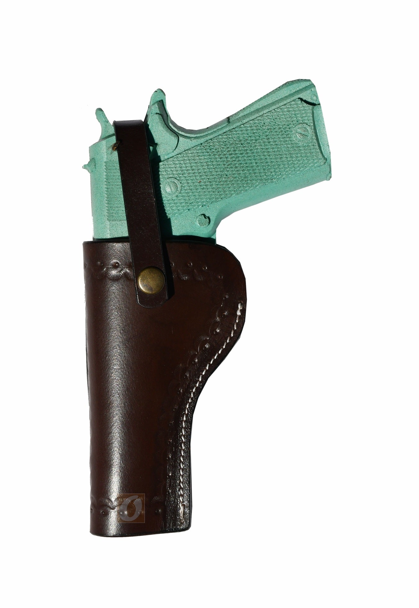 Left-handed brown outside the waistband 1911 holster, featuring deep sea shell tooling and premium full-grain leather.
