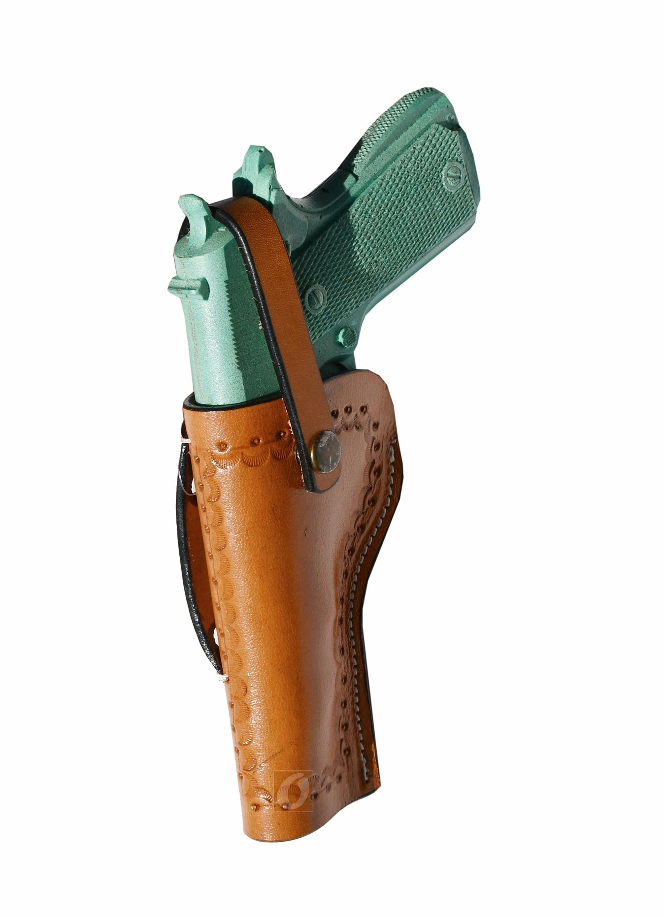 Angled shot of a handmade leather 1911 OWB holster, featuring detailed tooling and a secure belt loop.