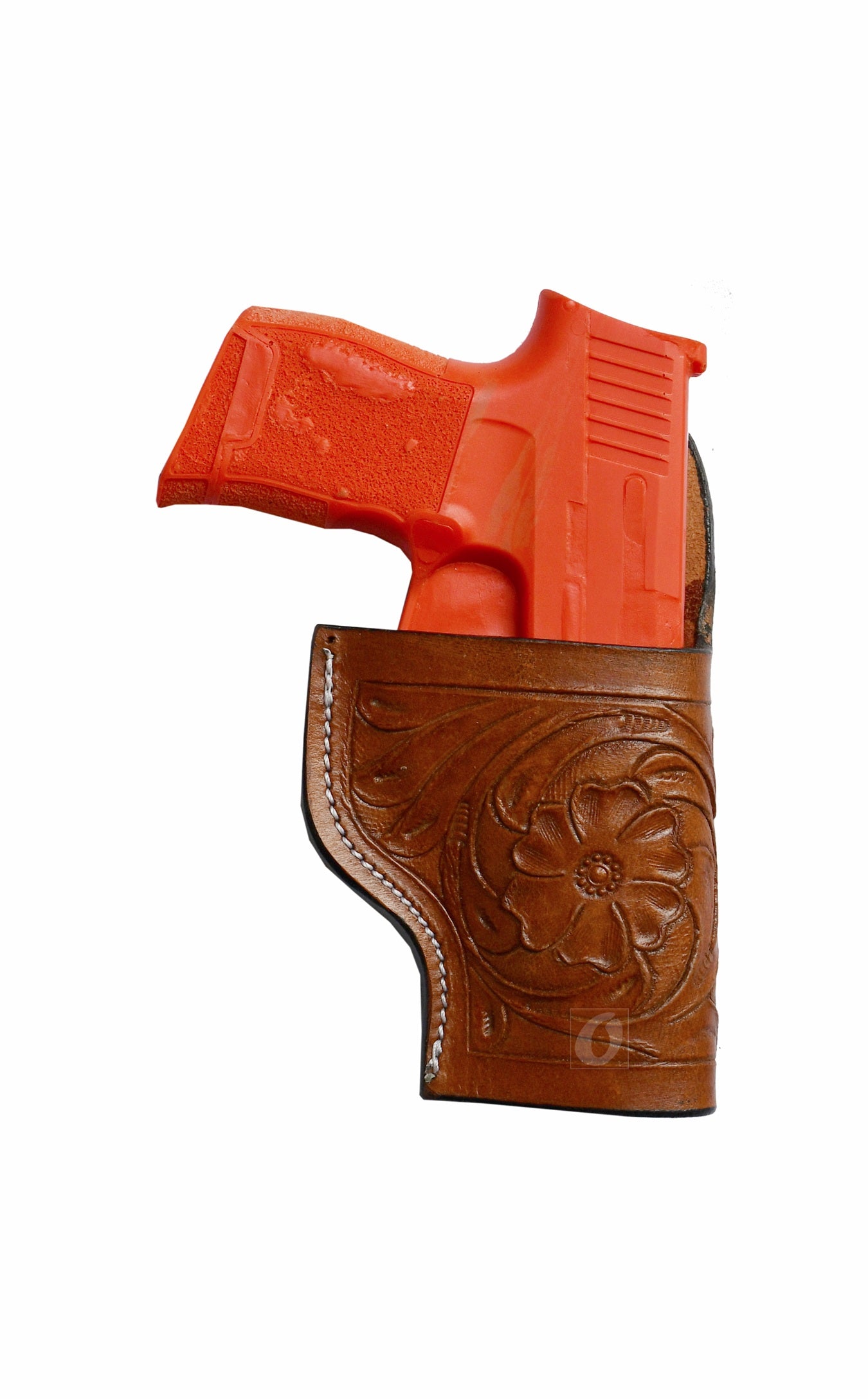 Right-handed floral tooled tan leather holster for Sig Sauer P365. A premium leather gun holster that combines Western-style craftsmanship with a secure fit, designed for everyday carry.