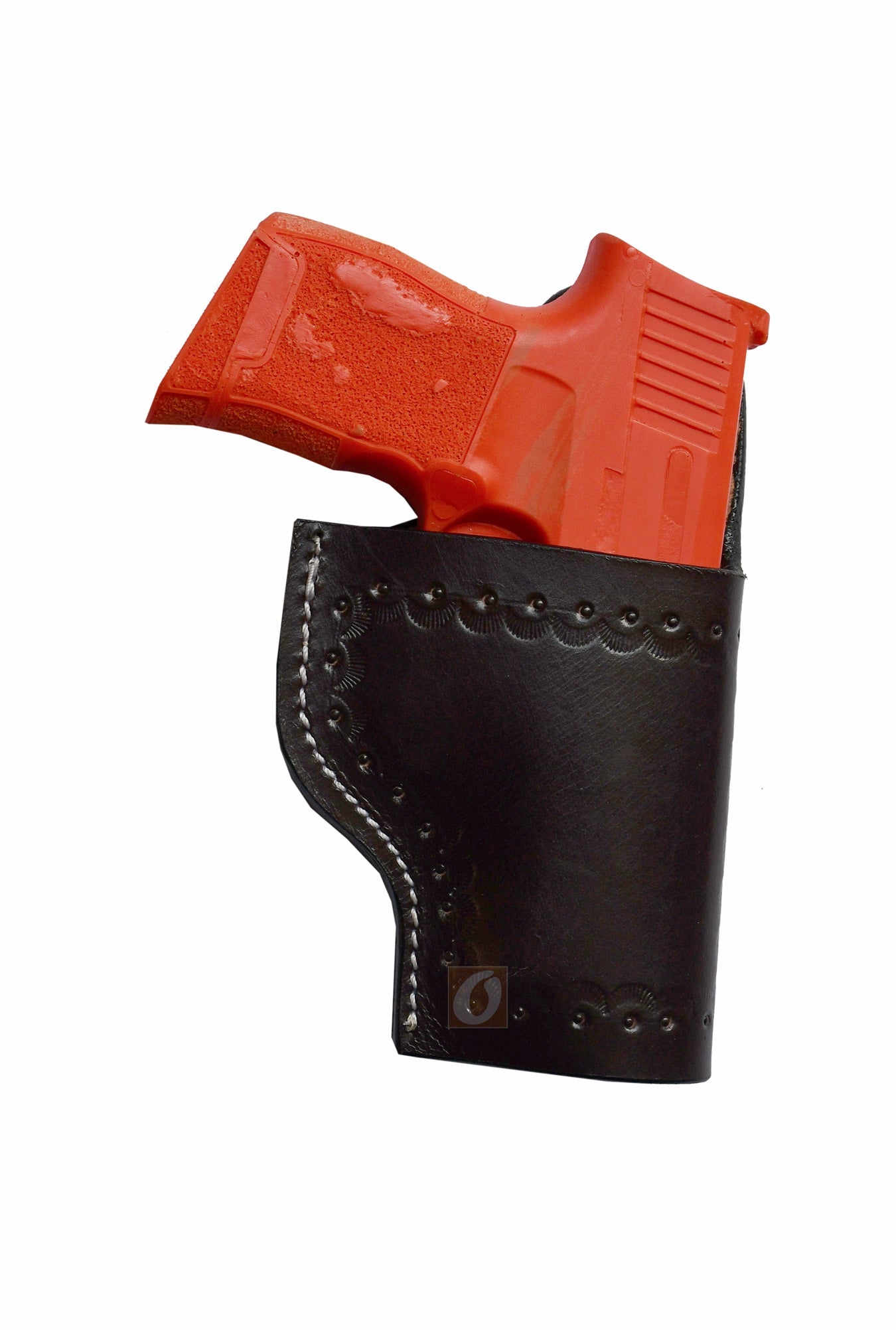 "Right-handed seashell tooled brown leather holster for Sig Sauer P365. A handcrafted gun holster offering a secure, comfortable fit with intricate seashell detailing and Western-style craftsmanship.