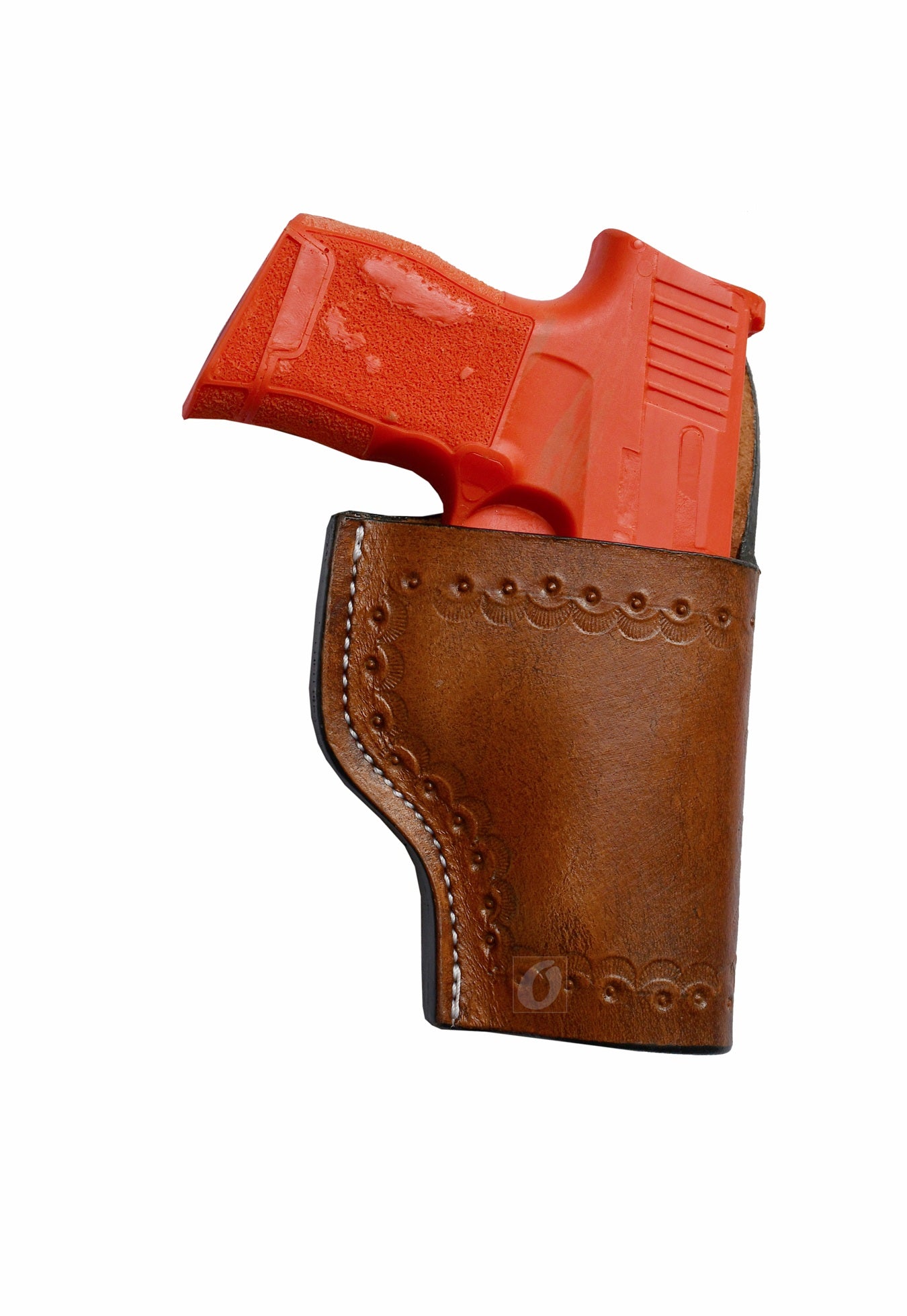 "Right-handed seashell tooled tan leather holster for Sig Sauer P365. A premium leather gun holster offering intricate seashell detailing and Western-style craftsmanship for secure and stylish firearm carry.
