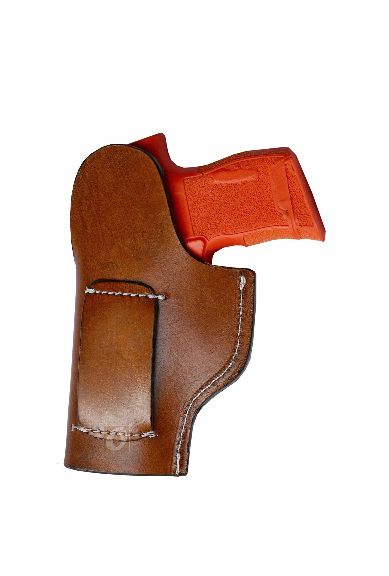 Western-style right-handed tan leather holster with seashell tooling, custom-made for Sig P365. A durable, high-quality leather holster that combines coastal-inspired design with reliable functionality.