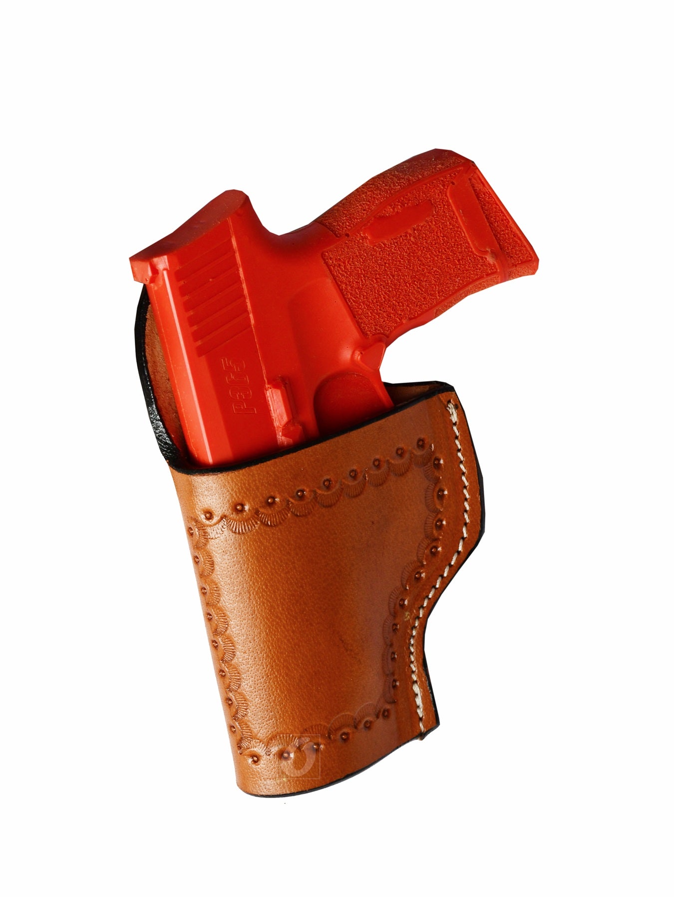 Handcrafted left-handed tan leather holster with seashell tooling, designed for Sig Sauer P365. A reliable gun holster blending durability with a unique coastal-inspired design.