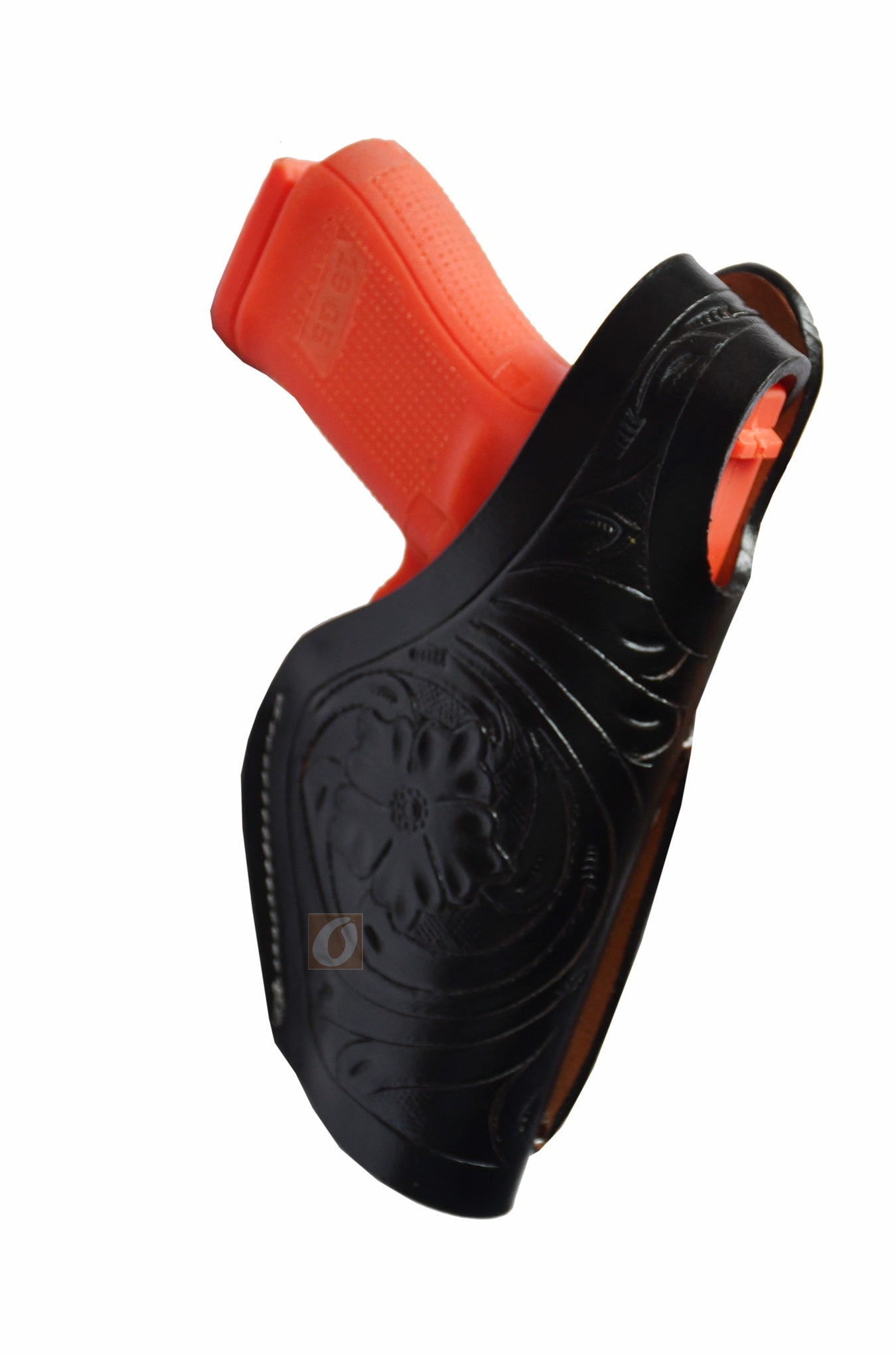 Black floral leather gun holster – right-handed holster with thumb retention and intricate tooled design, designed for Glock 17, Glock 19, S&W, and Ruger. A perfect blend of style and functionality.