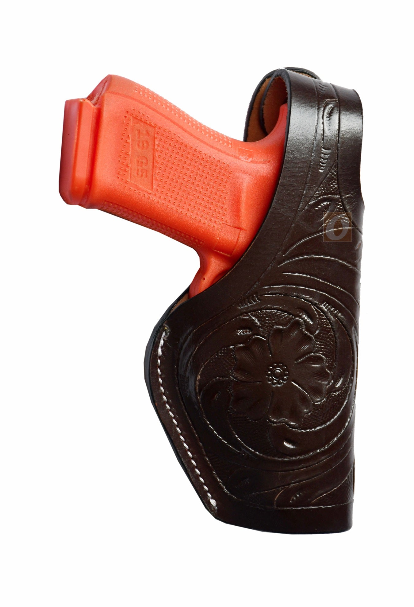 Right-handed brown tooled leather gun holster – features thumb retention and elegant floral tooling, made to fit Glock 17, Glock 19, S&W, and Ruger. A premium-quality holster for comfort and security.