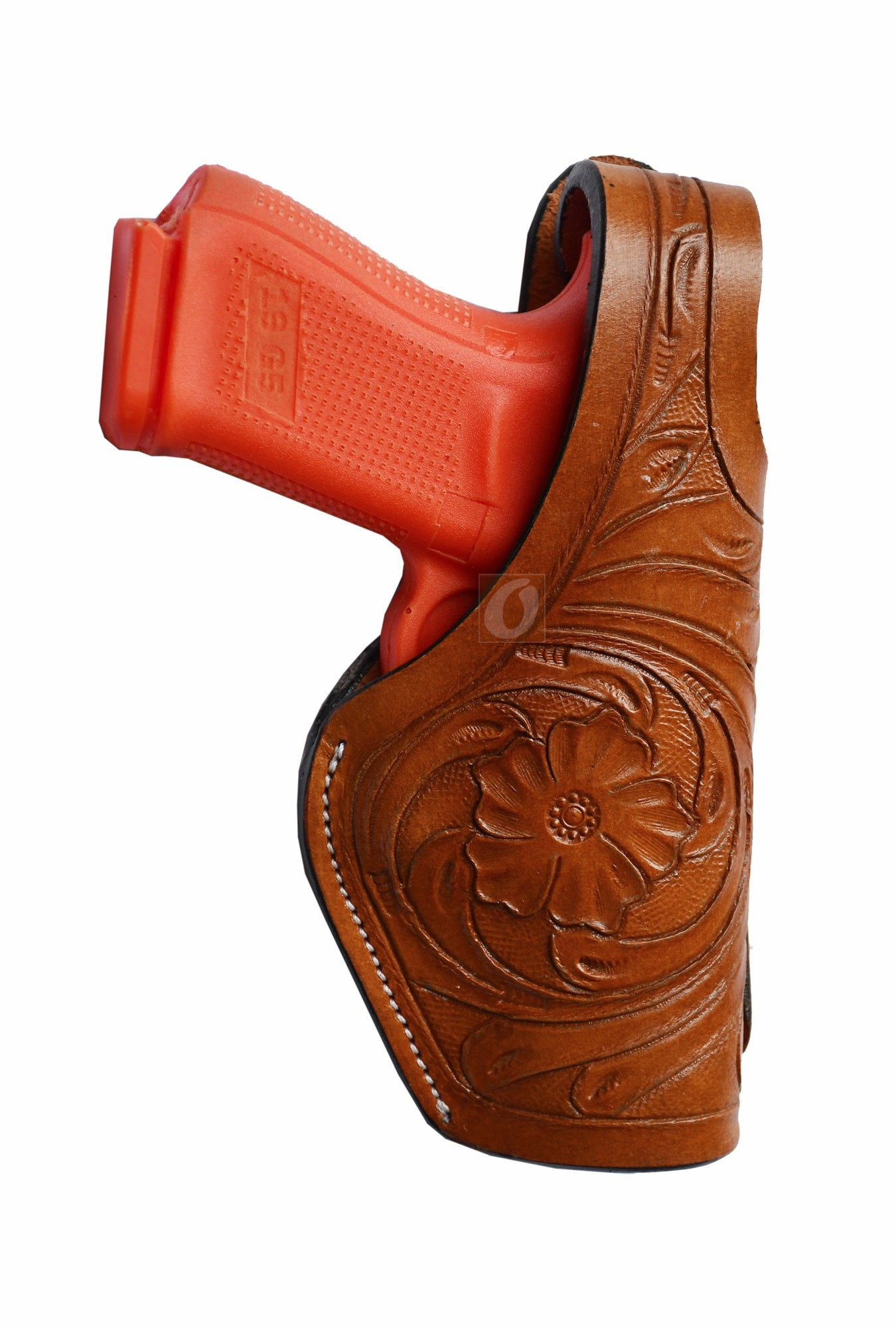 Right-handed tan tooled leather gun holster – features thumb retention and intricate floral tooling, designed to fit Glock 17, Glock 19, S&W, and Ruger. A durable, high-quality holster for secure firearm carry.