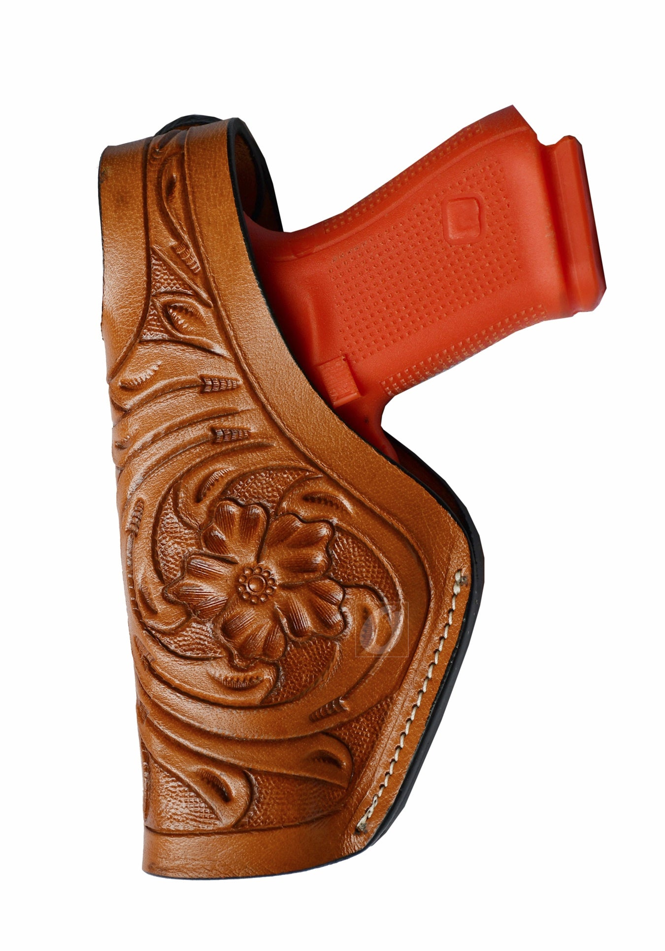Left-handed tan tooled leather gun holster – features thumb retention and intricate floral tooling, made to fit Glock 17, Glock 19, S&W, and Ruger. A premium leather holster for secure and comfortable firearm carry.