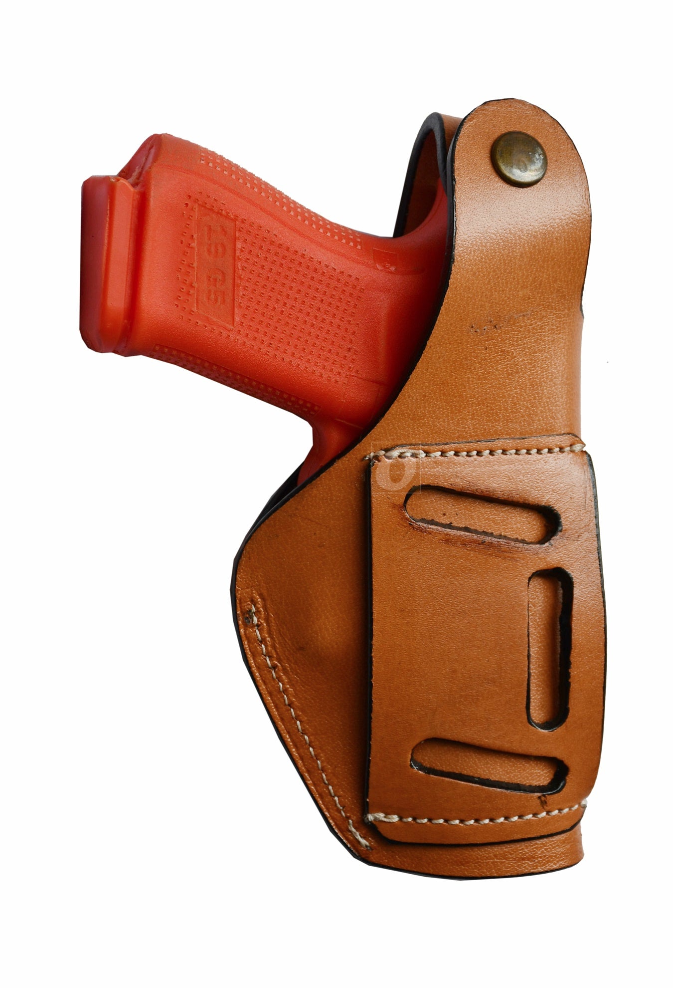 Floral tooled tan leather holster – left-handed design with thumb retention, crafted to fit Glock 17, Glock 19, S&W, and Ruger. A beautifully crafted gun holster for everyday concealed or open carry.