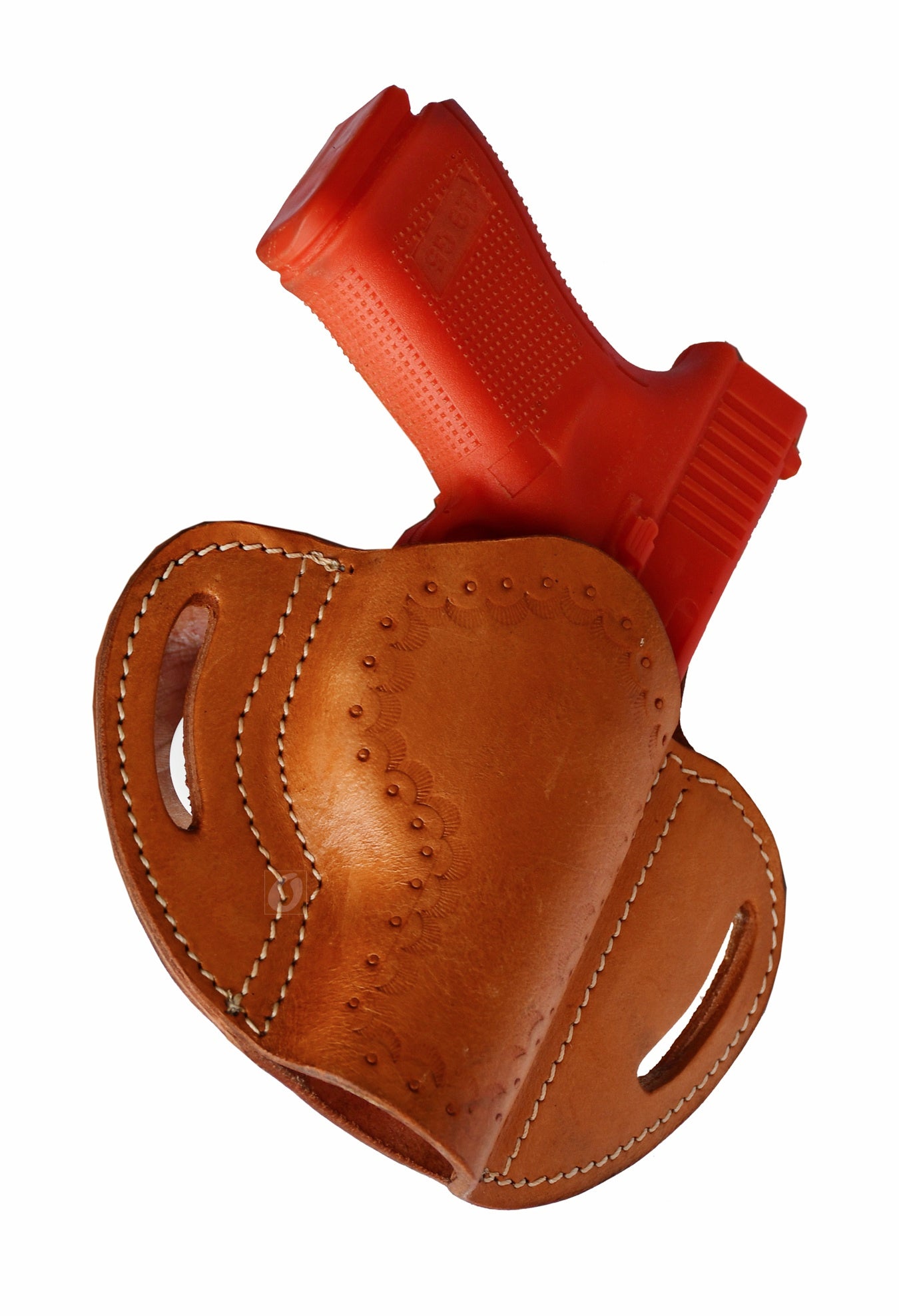 This tan leather holster features unique sea shell tooling and is designed for right-handed users. It fits Glock holster models like Glock 17 holster, Glock 19 holster, as well as Taurus PT111, Walther P99, and Springfield XD40.