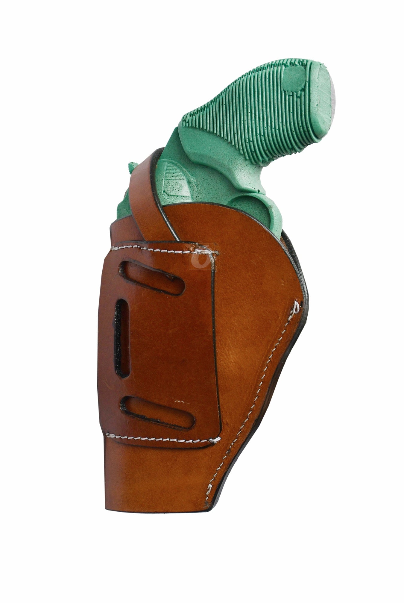 Handmade tan leather gun holster with elegant seashell tooling, designed for right-handed users. A stylish and functional Western holster for everyday carry or cowboy action shooting.